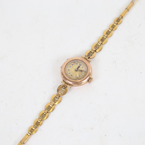 1016 - A lady's Vintage 9ct gold-cased mechanical wristwatch, on plated bracelet, working order, 18.8g gros... 