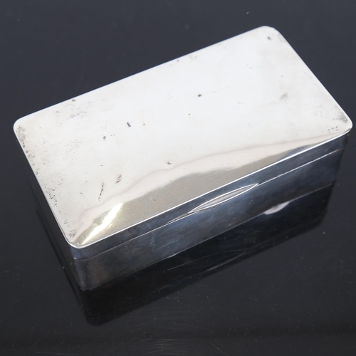 1058 - A silver rectangular cigarette box, indistinct hallmarks, 16cm x 9cm, 13.6oz gross