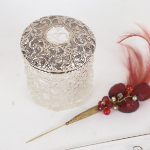 1078 - A silver-topped hobnail cut-glass dressing table jar, containing various hat pins, including sterlin... 