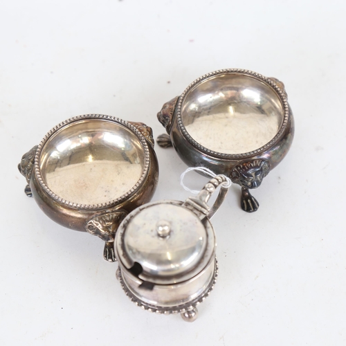 1094 - A pair of Victorian silver salts, on lion mask cast feet, London 1865, maker's marks HH for Henry Ho... 