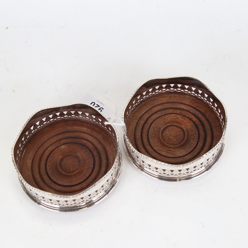 920 - A pair of silver plated oak wine coasters, by Francis Howard, diameter 10cm