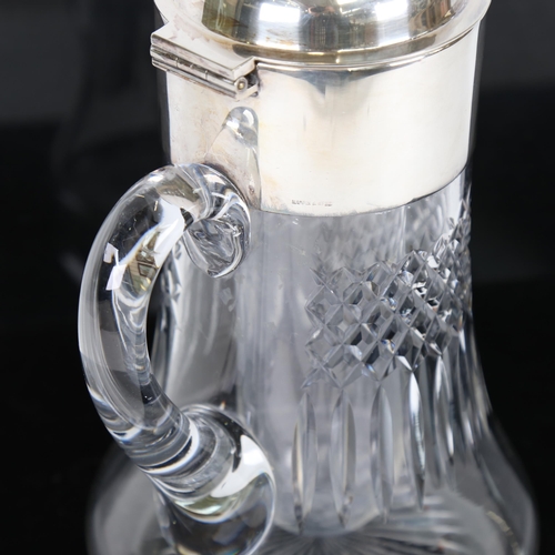 923 - A large Mappin & Webb silver plated and glass lemonade/water jug, with fitted insert