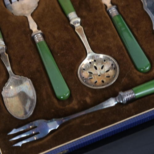 925 - A 1930s silver plated and green-handled serving set, cased