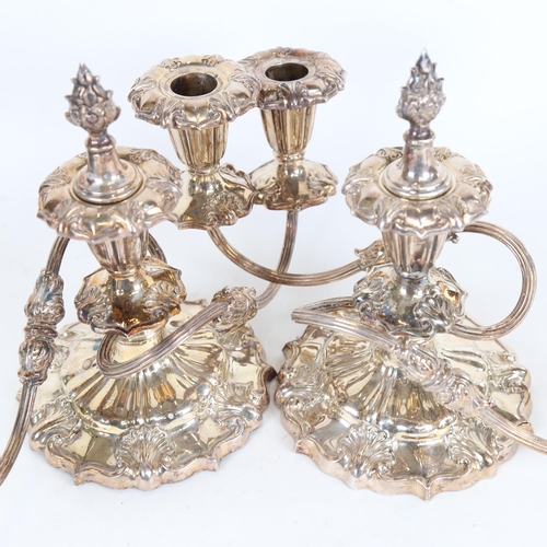 931 - A pair of silver plated and shell embossed 2-branch table candelabras