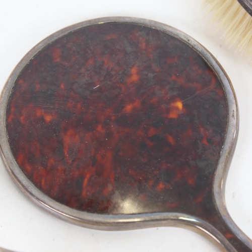 933 - A 1930s tortoiseshell and silver-mounted 3-piece brush and mirror set