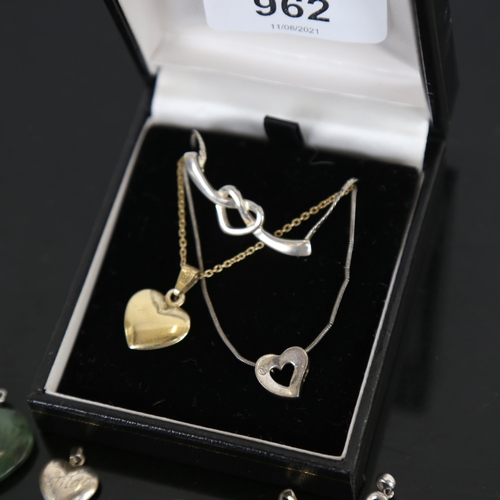 962 - A collection of silver heart design pendants (9)