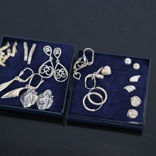 964 - 11 various pairs of silver earrings