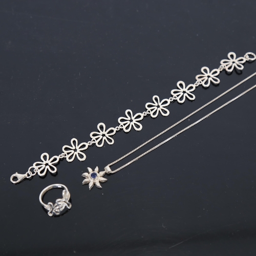 965 - A stylised silver bracelet and matching ring, a silver pendant and necklace etc