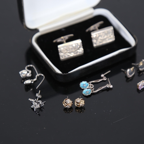 977 - A cased set of silver cufflinks, and 6 pairs of silver earrings