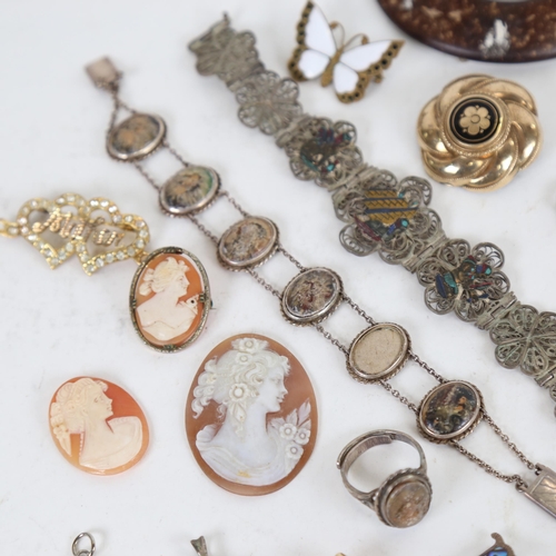 978 - A tray of Victorian and later jewellery, to include relief carved cameos, filigree panel bracelet, t... 