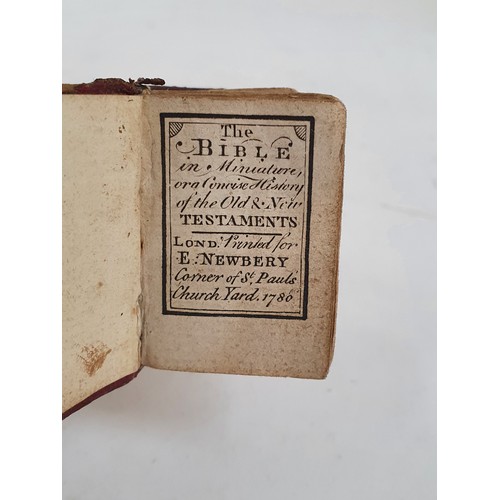 574 - An 18thC miniature Newbery illustrated Bible, dated 1780, height 4cm