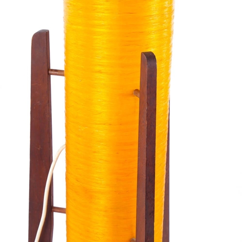 2097 - A 1970's retro yellow fibreglass 'rocket' lamp, on teak legs, height 110cm