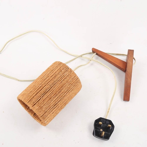 2102 - A Dutch mid century teak wall lamp with jute shade, label on bracket, drop 28cm