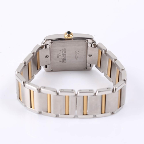 23 - CARTIER - a mid-size bi-metal Tank Francaise quartz bracelet watch, ref. 2465, silvered dial with Ro... 