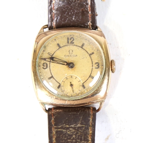 40 - OMEGA - a Vintage gold plated cushion cased mechanical wristwatch, circa 1930s, silvered dial with q... 