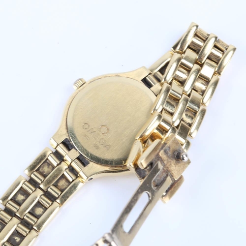 53 - OMEGA - a lady's 18ct gold quartz bracelet watch, ref. 595.0101, circa 1990, cream dial with gilt qu... 