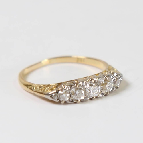 114 - A Victorian 18ct gold graduated 5-stone diamond half hoop ring, set with old cut diamonds and rose c... 