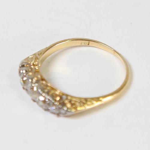 114 - A Victorian 18ct gold graduated 5-stone diamond half hoop ring, set with old cut diamonds and rose c... 