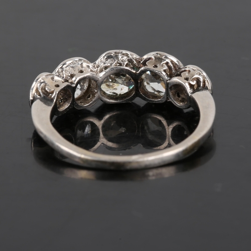 119 - A mid-20th century platinum graduated 5-stone diamond ring, bezel set with old European cut diamonds... 