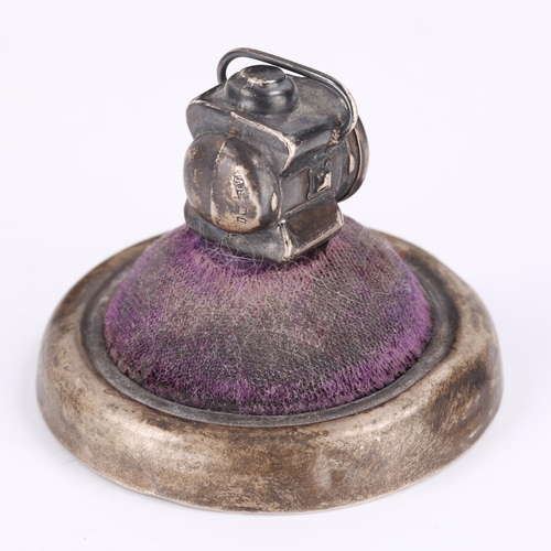 126 - A rare George V novelty silver railway lantern pin cushion, circular base with purple velvet and pas... 