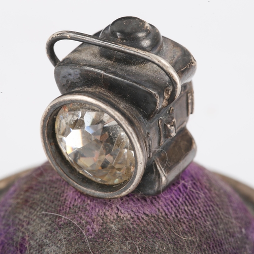 126 - A rare George V novelty silver railway lantern pin cushion, circular base with purple velvet and pas... 