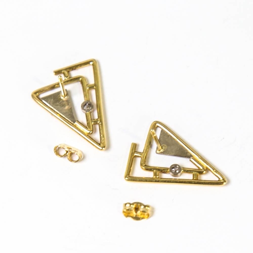 131 - A pair of late 20th century modernist 18ct white and yellow gold diamond earrings, geometric triangu... 