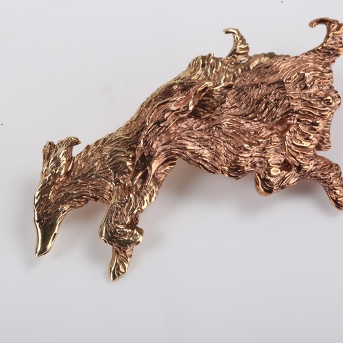 136 - A modern two-tone 9ct gold figural Afghan Hound dog brooch, modelled running with textured settings,... 