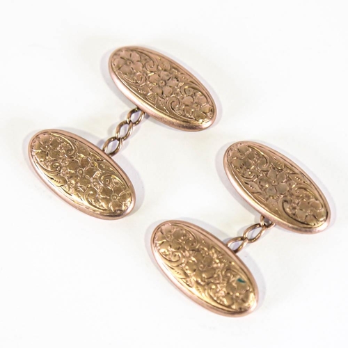 138 - A pair of early 20th century 9ct rose gold cufflinks, oval floral engraved panels, hallmarks Birming... 