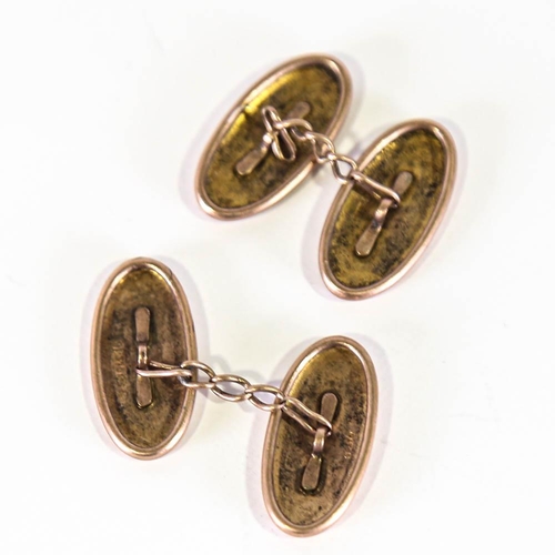 138 - A pair of early 20th century 9ct rose gold cufflinks, oval floral engraved panels, hallmarks Birming... 