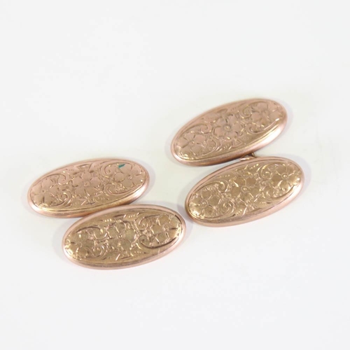 138 - A pair of early 20th century 9ct rose gold cufflinks, oval floral engraved panels, hallmarks Birming... 