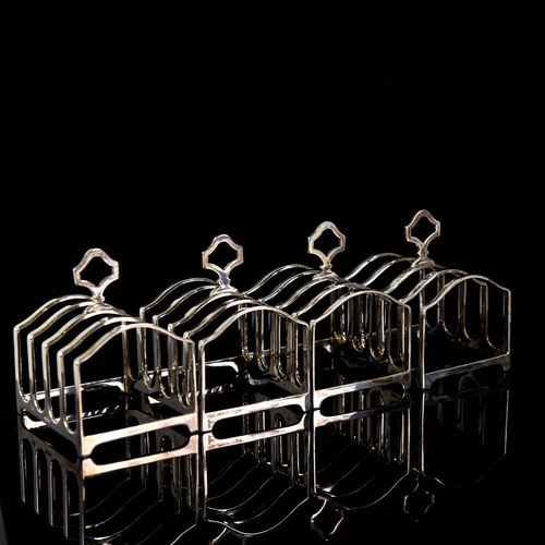 144 - A set of 4 George VI silver 5-bar toast racks, by Adie Brothers Ltd, hallmarks Birmingham 1939, leng... 