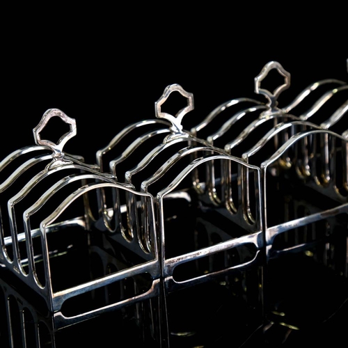 144 - A set of 4 George VI silver 5-bar toast racks, by Adie Brothers Ltd, hallmarks Birmingham 1939, leng... 