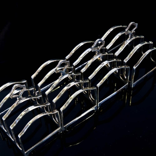 144 - A set of 4 George VI silver 5-bar toast racks, by Adie Brothers Ltd, hallmarks Birmingham 1939, leng... 