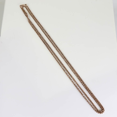 156 - A Victorian gold plated long guard chain, with faceted belcher links and dog clip, chain length 138c... 