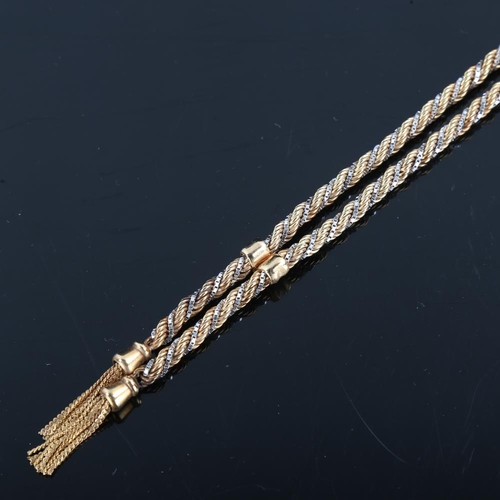 157 - A late 20th century 9ct yellow and white gold necklace, ropetwist and boxlinks with tassel terminals... 