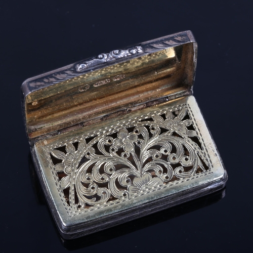 161 - A Victorian silver niello vinaigrette, rectangular form with allover engraved foliate decoration and... 