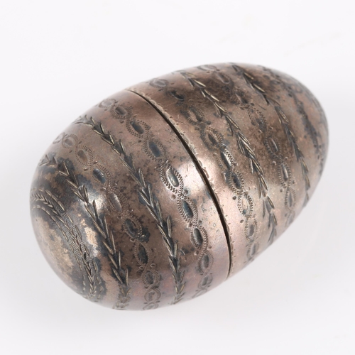 166 - A George III silver egg nutmeg grater, circa 1780, bright cut engraved band decoration with detachab... 