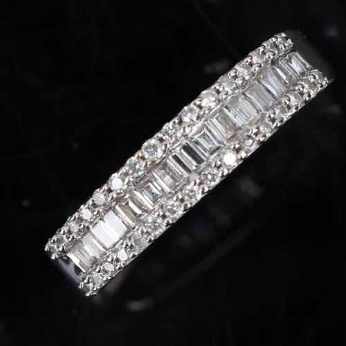 171 - A modern 18ct white gold diamond cluster half hoop band ring, set with baguette and round brilliant ... 