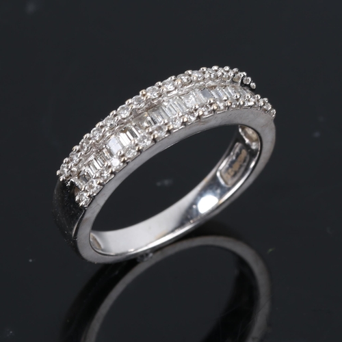 171 - A modern 18ct white gold diamond cluster half hoop band ring, set with baguette and round brilliant ... 