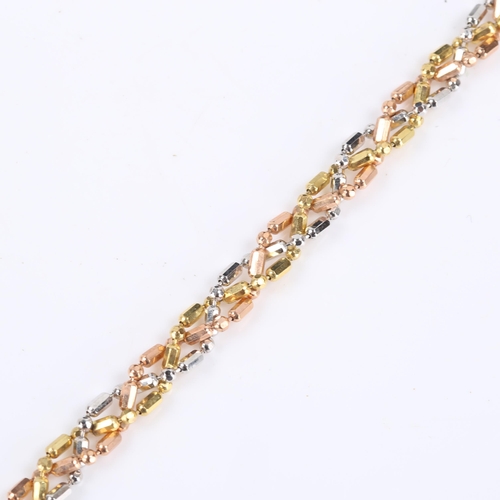 173 - A modern 9ct tri-colour gold twisted link bracelet, length 18.5cm, 6.8g