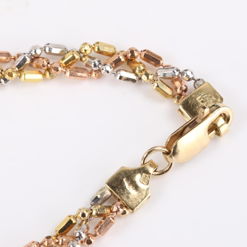 173 - A modern 9ct tri-colour gold twisted link bracelet, length 18.5cm, 6.8g