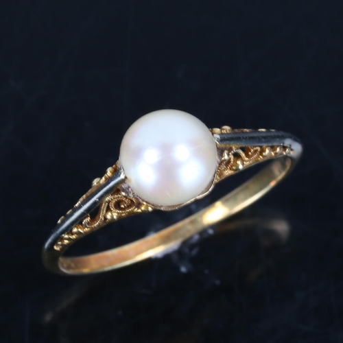 174 - A Japanese 14ct gold whole pearl ring, open scrollwork bridge and closed back settings, pearl diamet... 