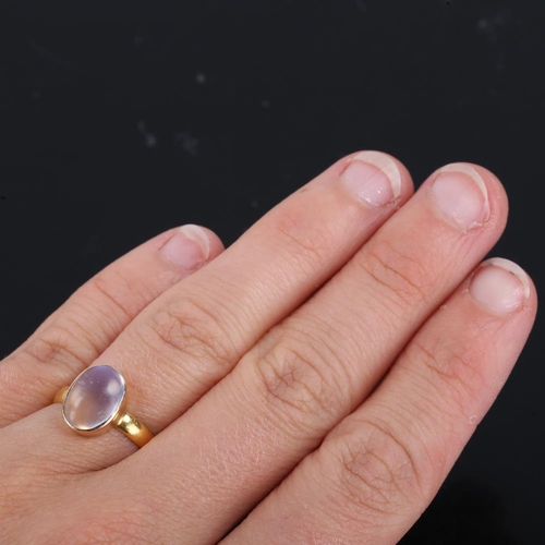 179 - A Victorian 22ct gold moonstone ring, plain bezel set with oval cabochon blue moonstone, maker's mar... 