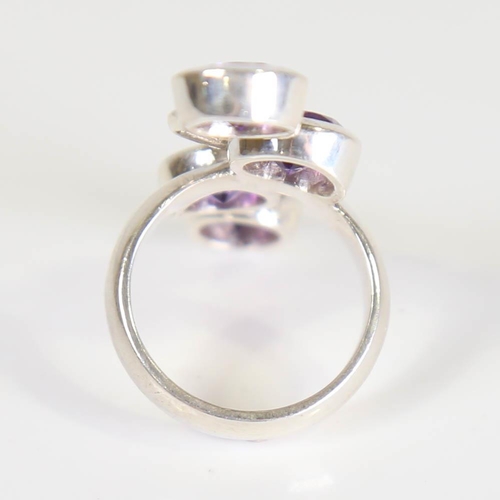 192 - A large modern handmade silver amethyst abstract ring, set with round cut amethyst, setting height 4... 