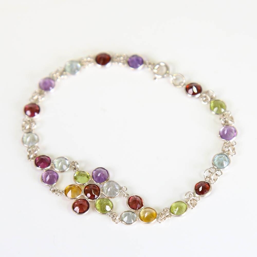 205 - A modern handmade silver gem-set floral bracelet, round cut gemstones include peridot, citrine, amet... 