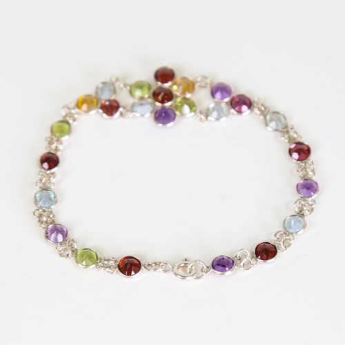 205 - A modern handmade silver gem-set floral bracelet, round cut gemstones include peridot, citrine, amet... 