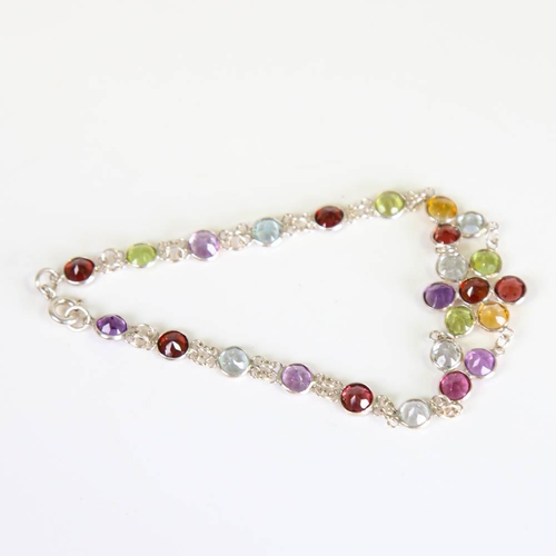 205 - A modern handmade silver gem-set floral bracelet, round cut gemstones include peridot, citrine, amet... 