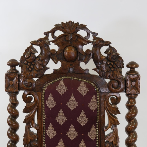 1431 - Victorian Carolean style oak armchair, with phoenix decorated pediment and lion mask arms