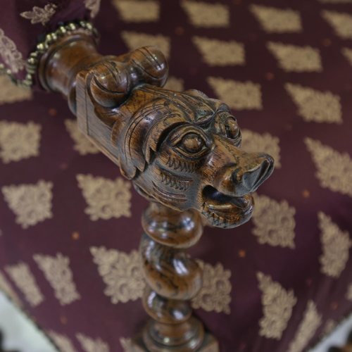 1431 - Victorian Carolean style oak armchair, with phoenix decorated pediment and lion mask arms