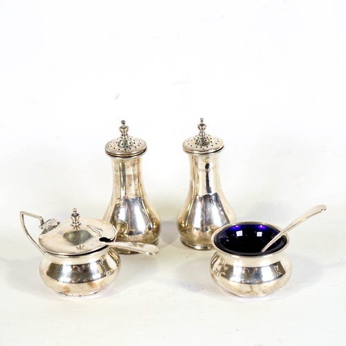 360 - A George V silver 4-piece cruet set, baluster form with blue glass liners, by F H Adams & Co, hallma... 